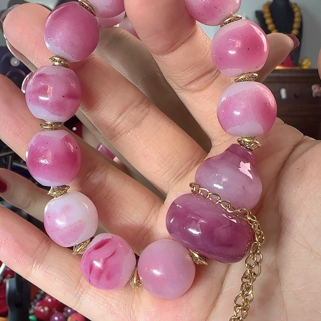 玻璃颈饰老琉璃的故事是什么呢我的故事是