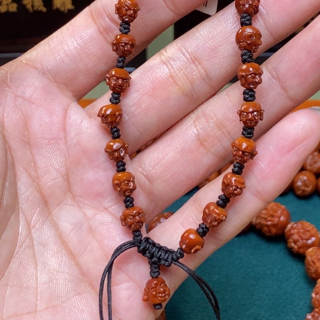 用***7橄榄核吊坠Dhd核尖