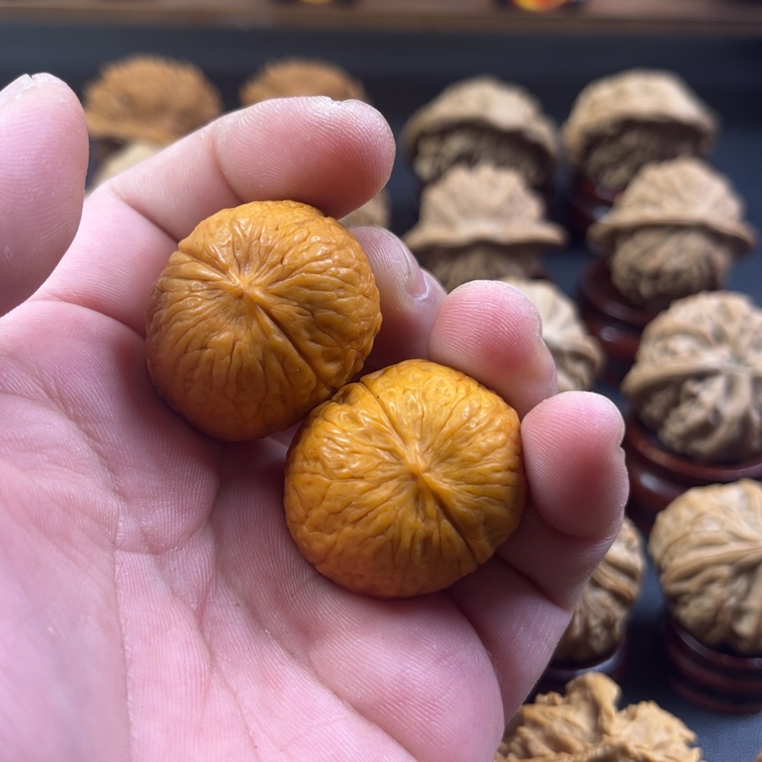 文玩核桃把件她*。云铁元宝