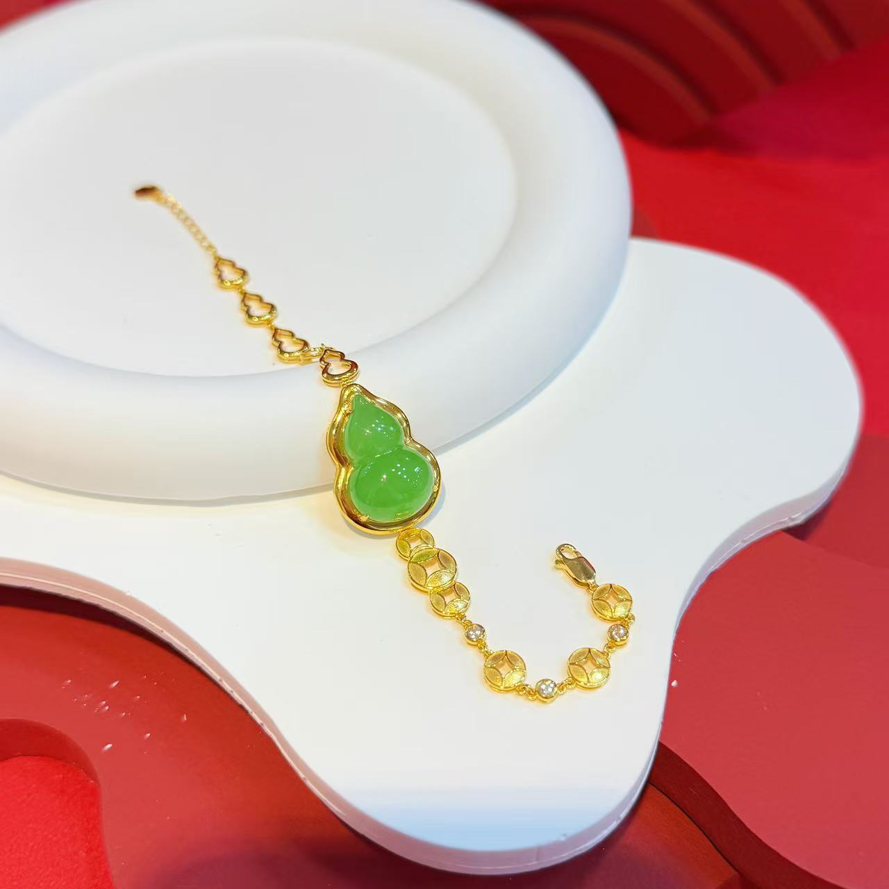 【红娘子】18K金钱钱镶嵌20mm和田玉苹果绿葫芦手链HNZ9687