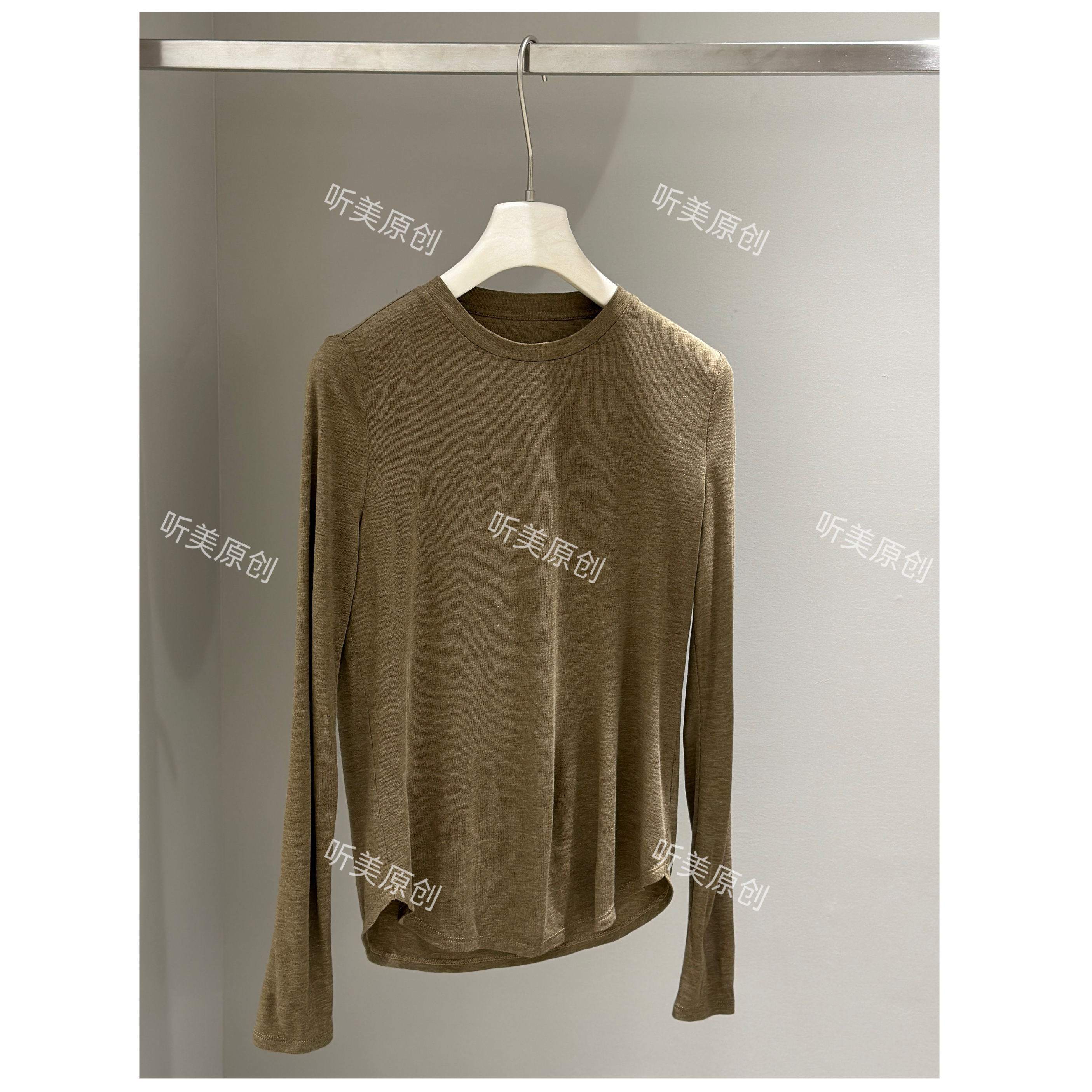 【媚儿推荐】纯色圆领弧下摆长袖简约