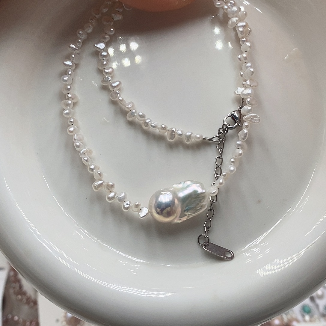 淡水珍珠银S925镶嵌耳饰