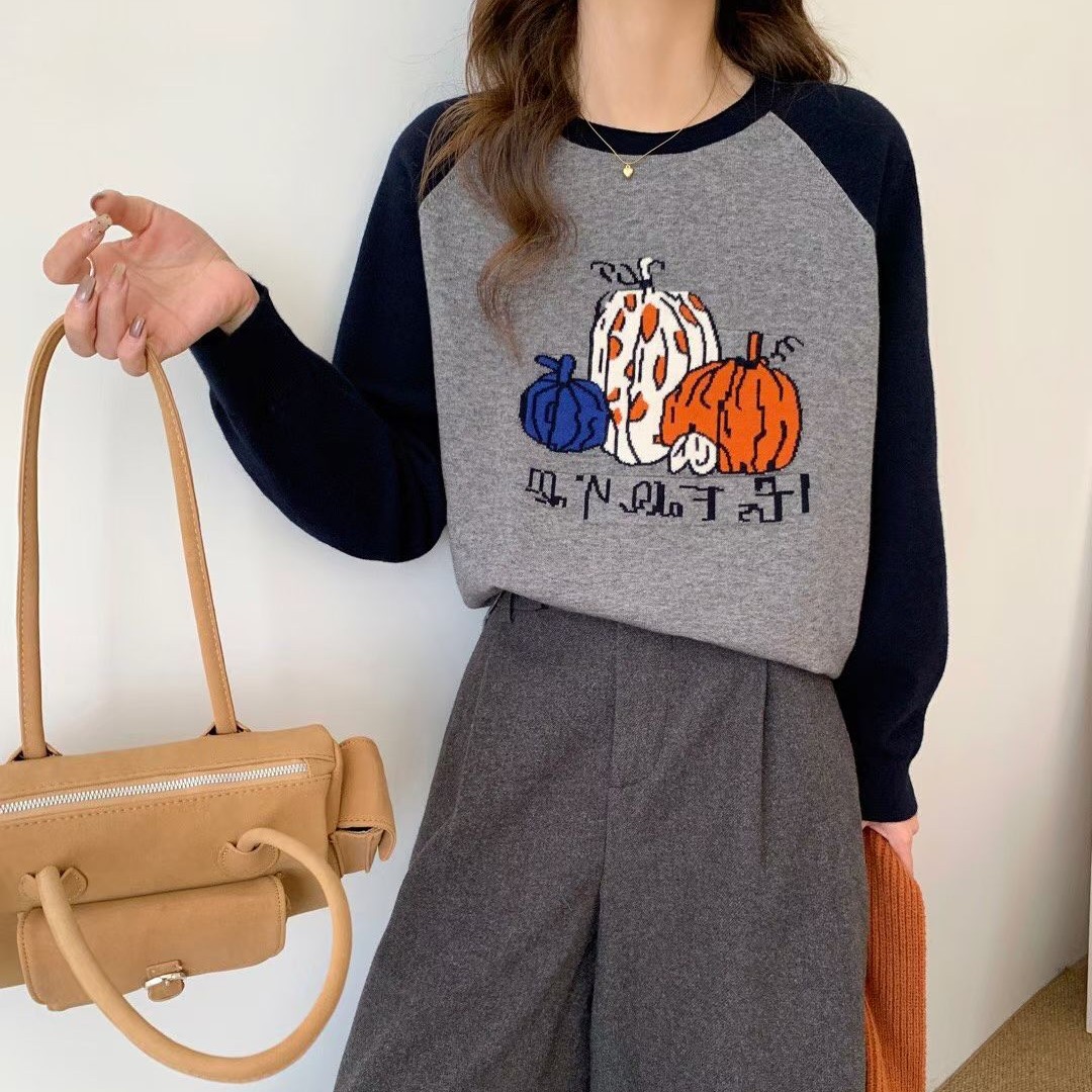 安馨家时尚南瓜拼色毛衫