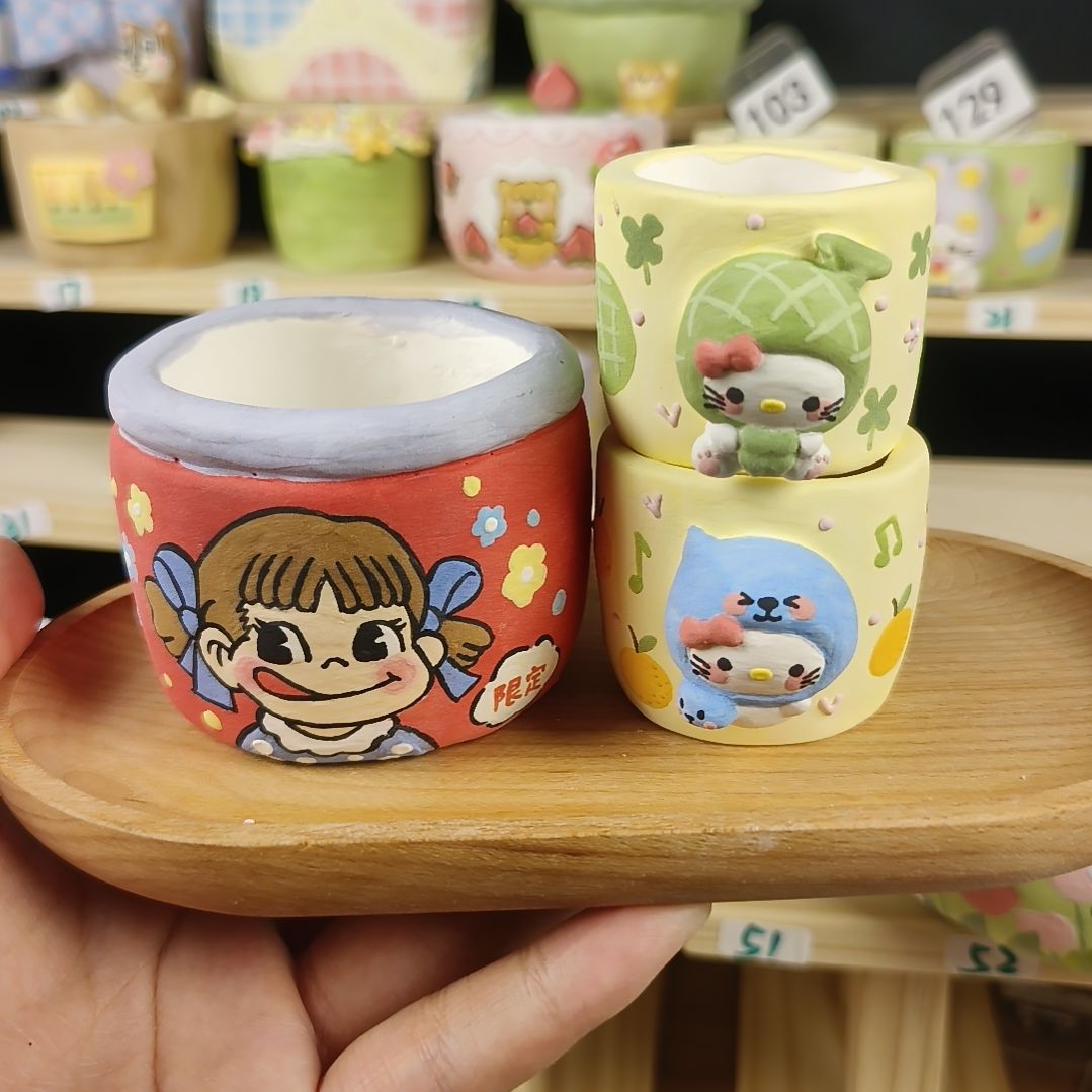 炭***炭酷儿凯蒂猫不二家饮料罐罐花盆