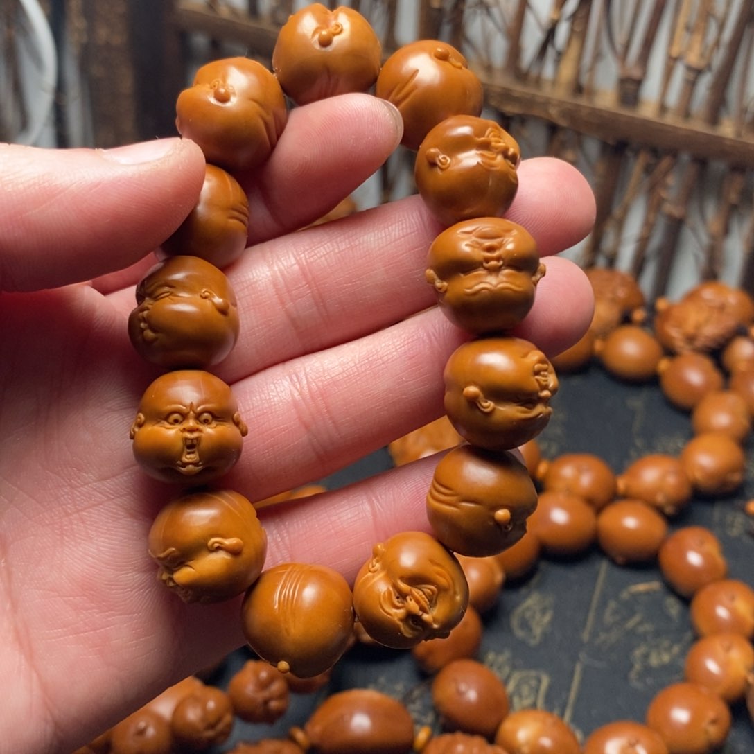 橄榄核手串?****夏百态