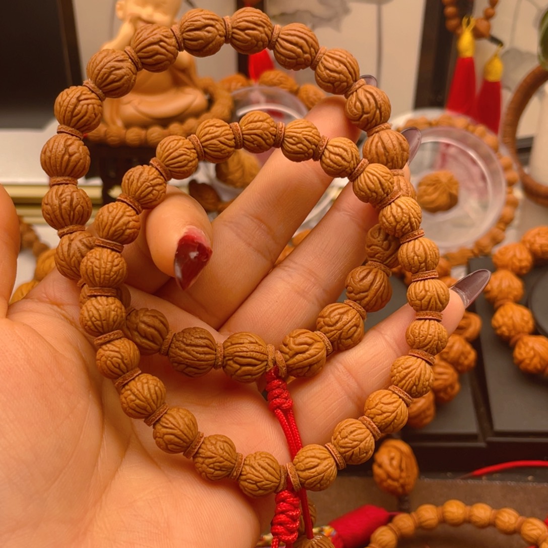 半***名桃核手串红红火火。红红火火