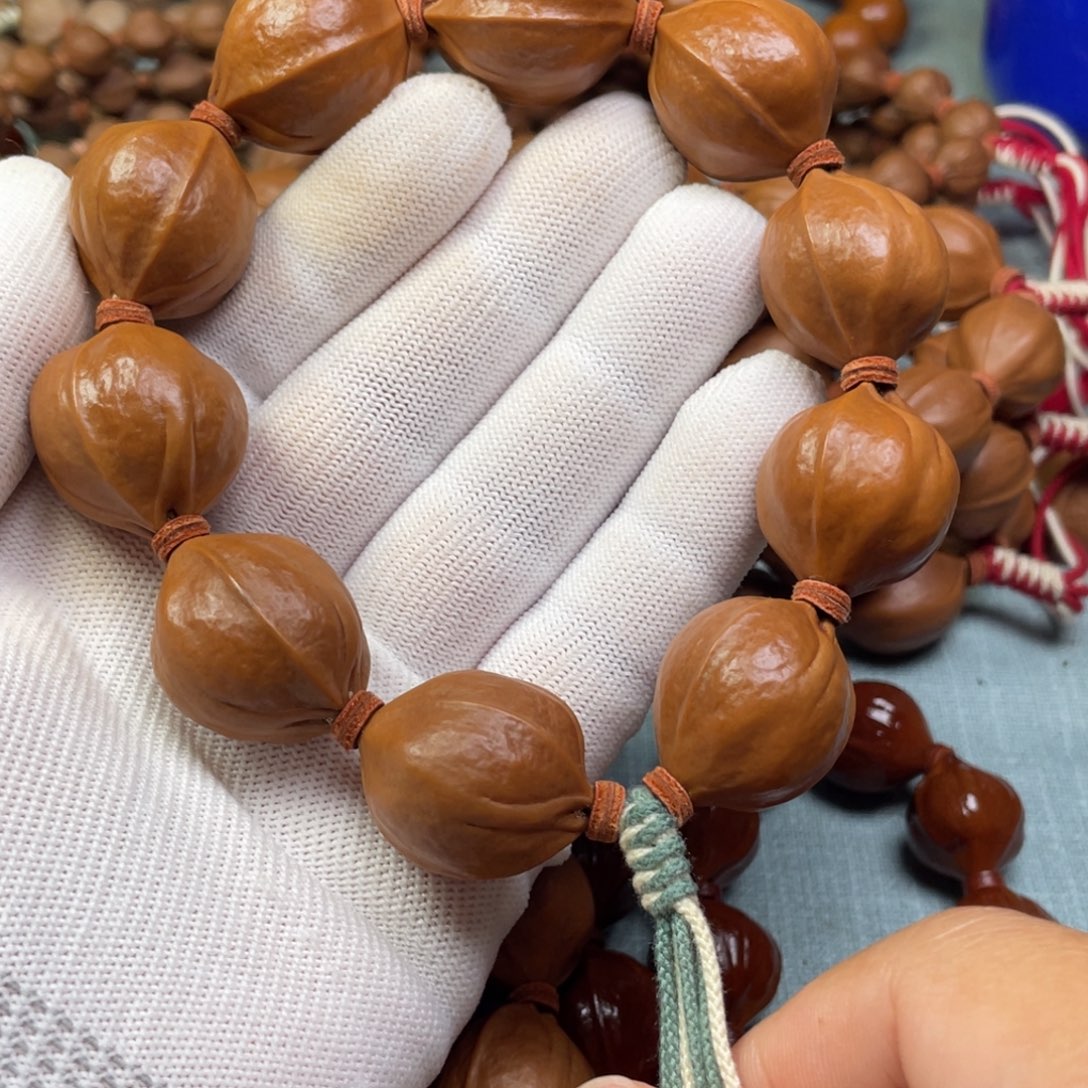 牛***羽橄榄核手串/手链2327梅林铁核