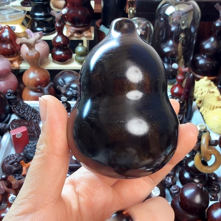 惠***龙木紫光檀人参果一个木