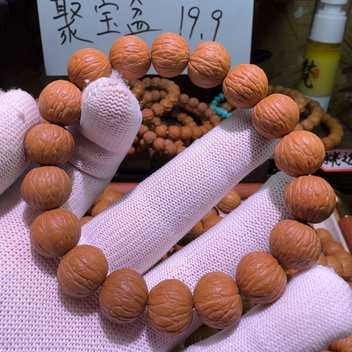 *****猴头原皮凤羽手串