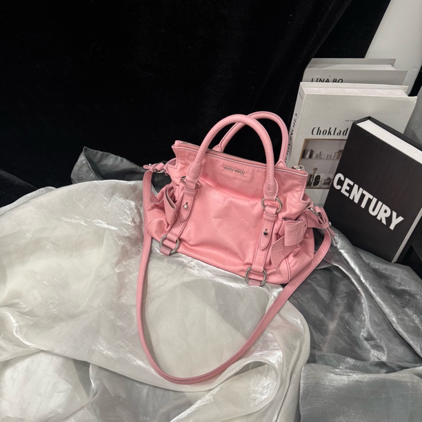 95新 MIU MIU/缪缪 缪缪 粉色斜挎包单肩包