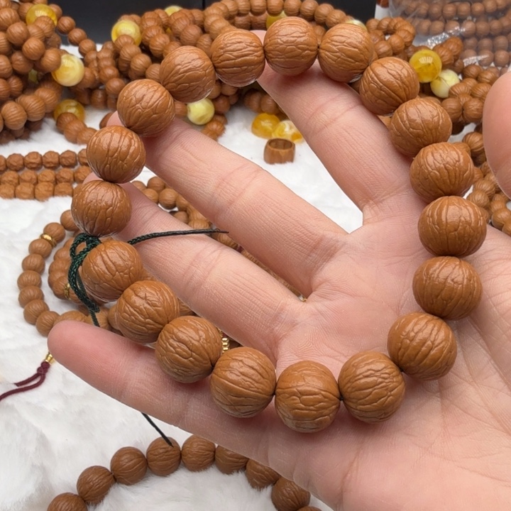晴***￴猴头核桃手串15凤羽原皮原色原生态
