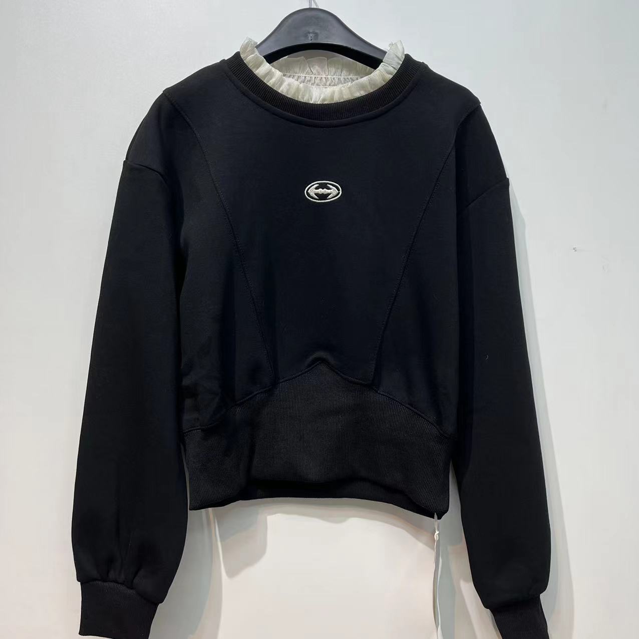 E90182时尚蕾丝圆领黑色卫衣