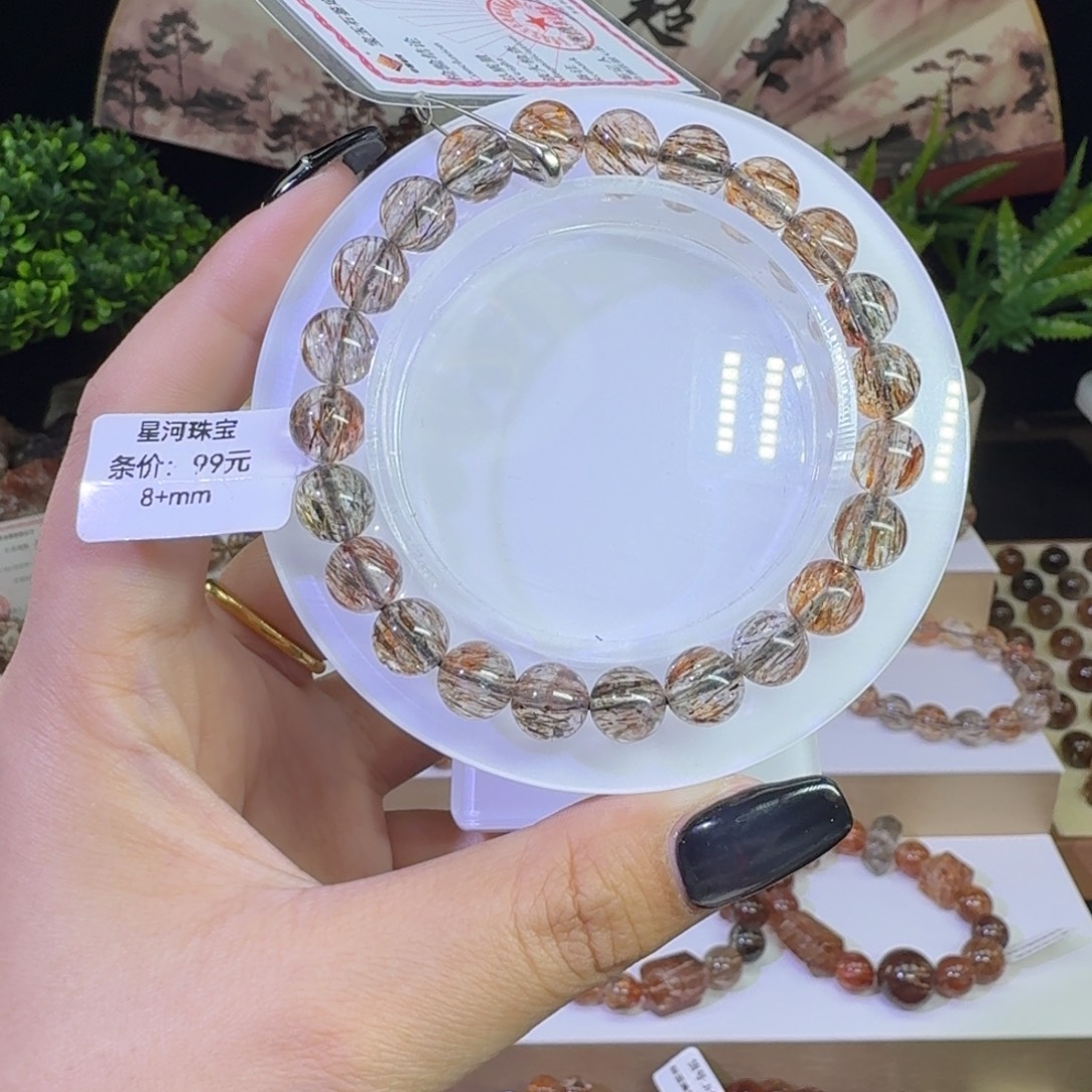 茉***ヾ未镶嵌手链水晶黑金超七