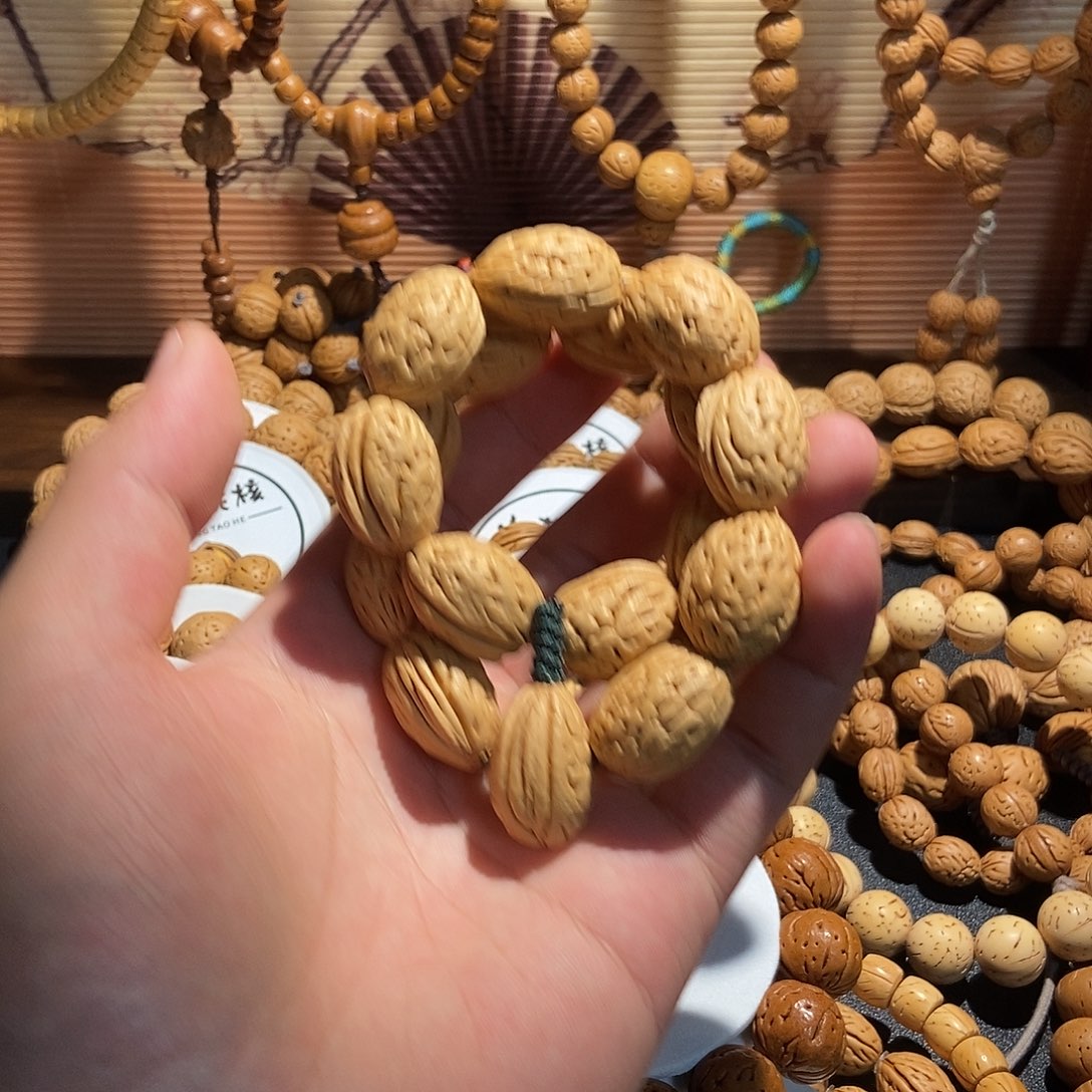 摆***福桃核手串肌肉纹桃核钱袋子