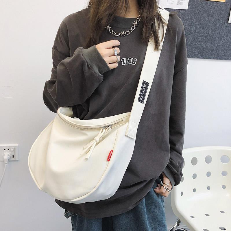 大容量帆布包包女2022新款休闲简约ins日系学生上课包饺子包斜挎