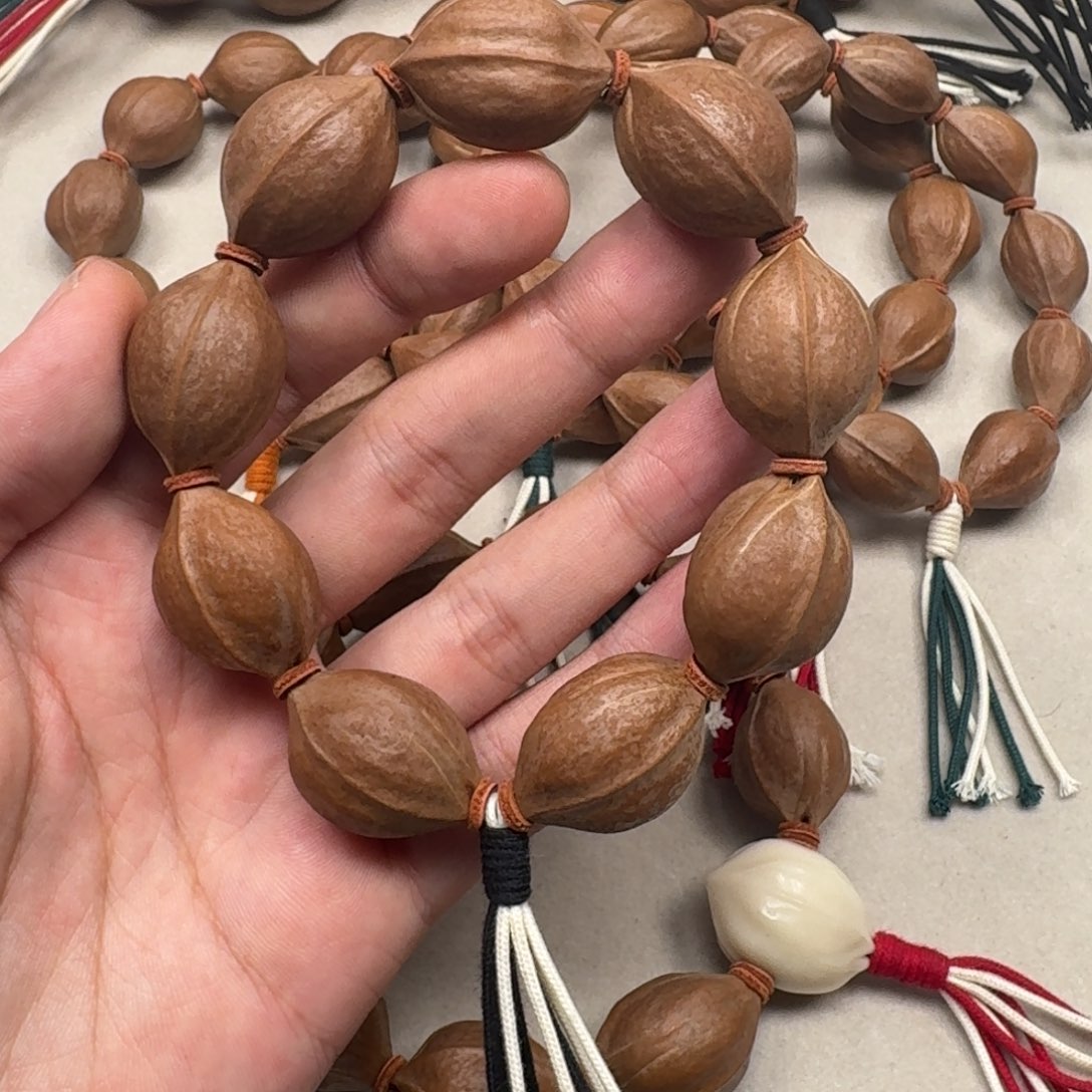 L***—梅林铁核手串1928