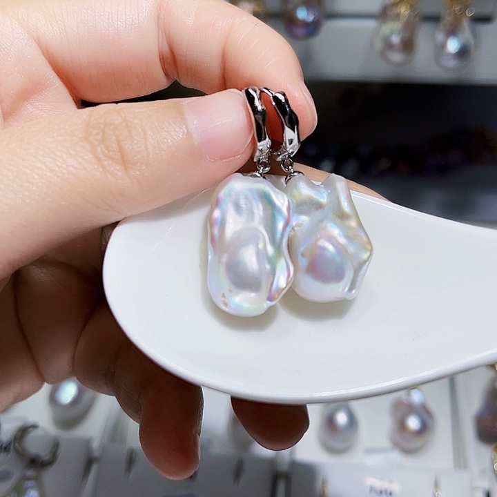 淡水珍珠耳饰银S925镶嵌不***?