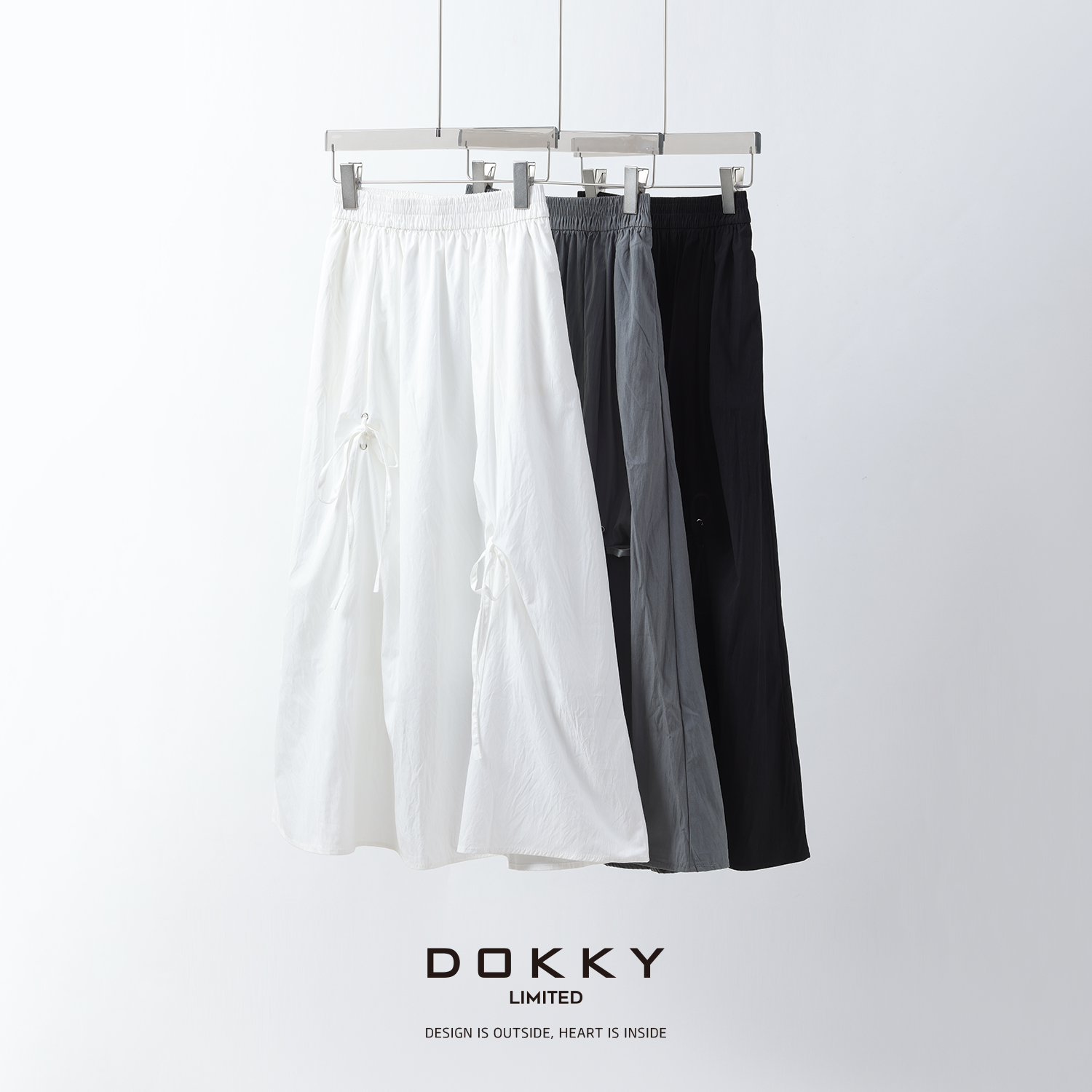 【小步舞曲】DOKKY机能面料.遮胯显瘦.设计感|蝴蝶结半身伞裙