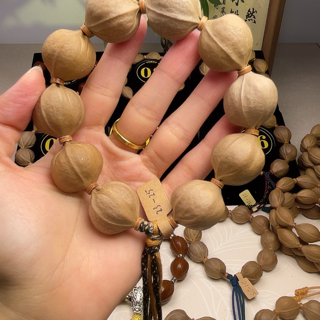 小***觉手串橄榄核梅林铁核23*25
