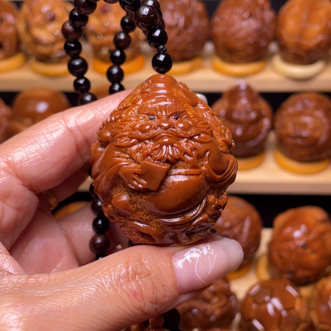 橄榄核把件登**月巴西大橄榄