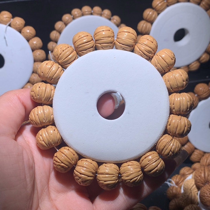 桃核手串桃核手串树王纽扣