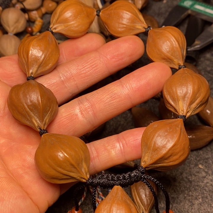 橄榄核手串2.4四花28号