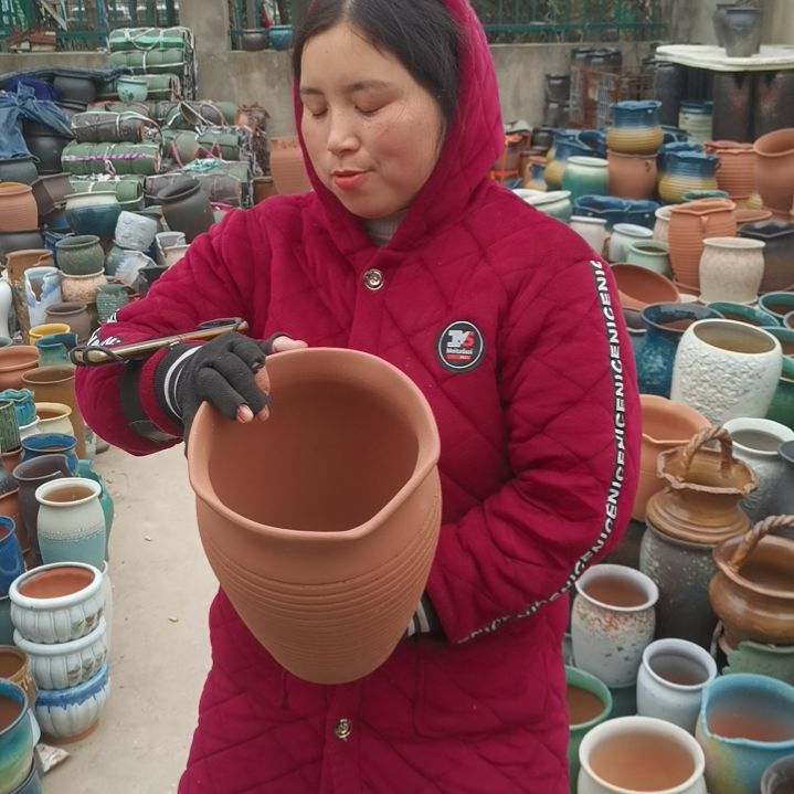 红陶口20高29瑕疵口变形扁了