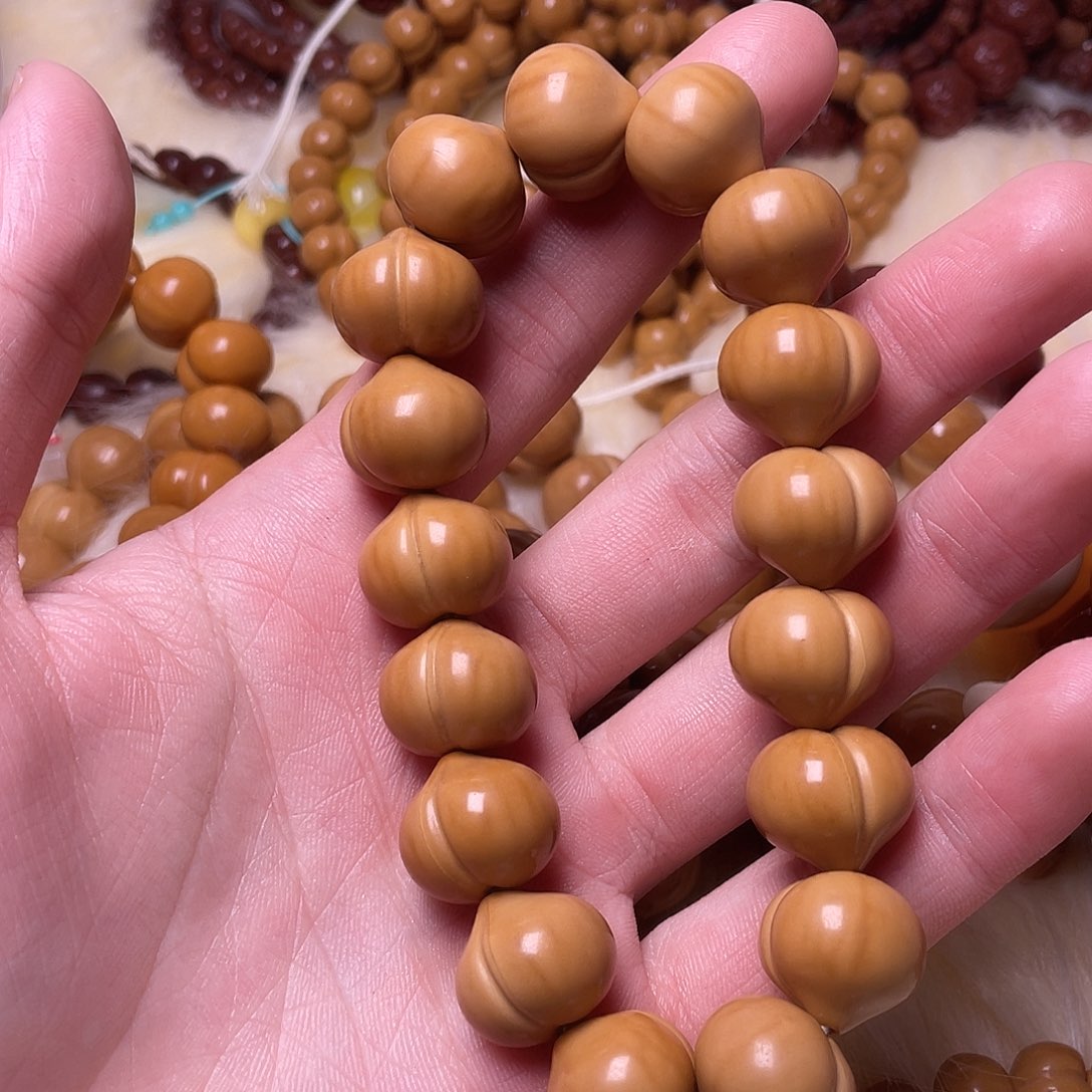 泽***.手串猴头核桃屁桃17科机