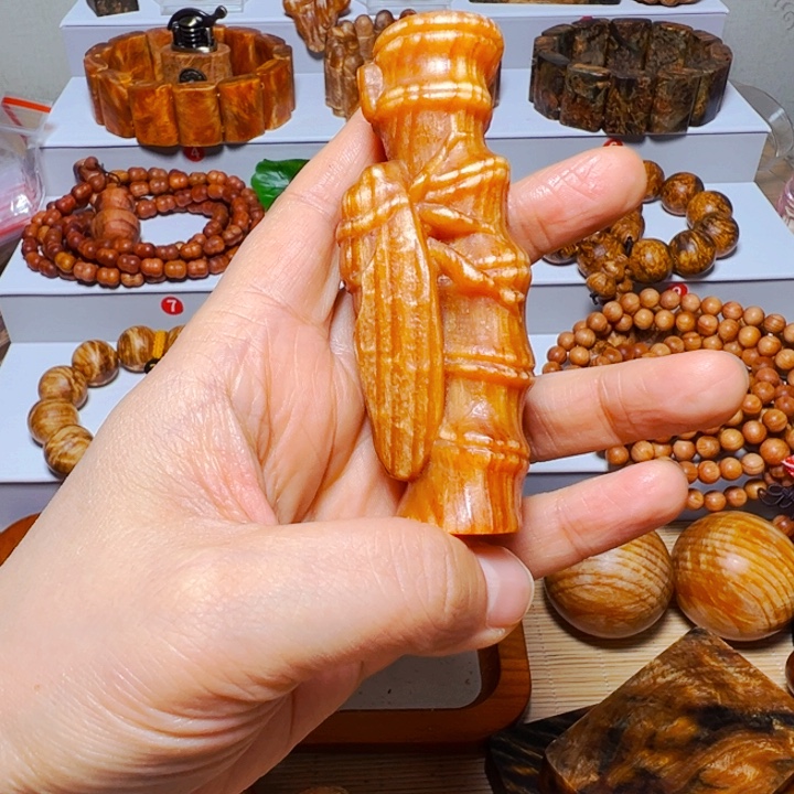 哈***木质非金属琥珀木玉化把件