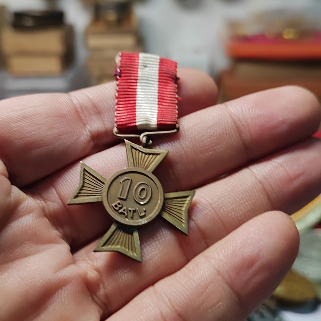 吴***风外国早期的纪念章一个