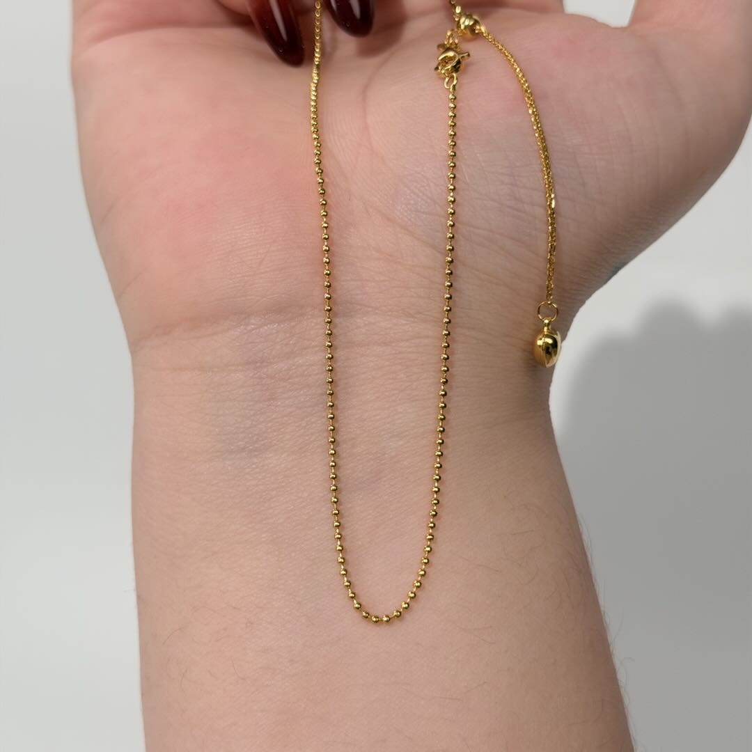 【金项链】爱心抽拉珠珠黄金素链足金999零附加百搭精致时尚必备款