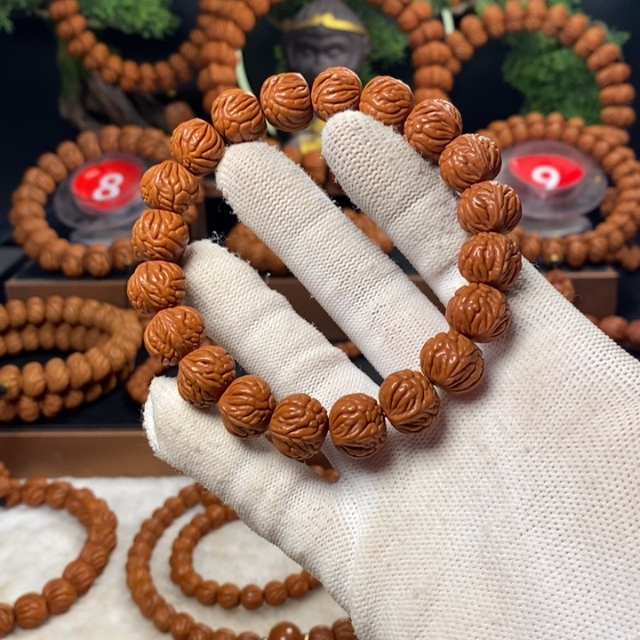 桃核吊坠犭**亍秦岭龙纹