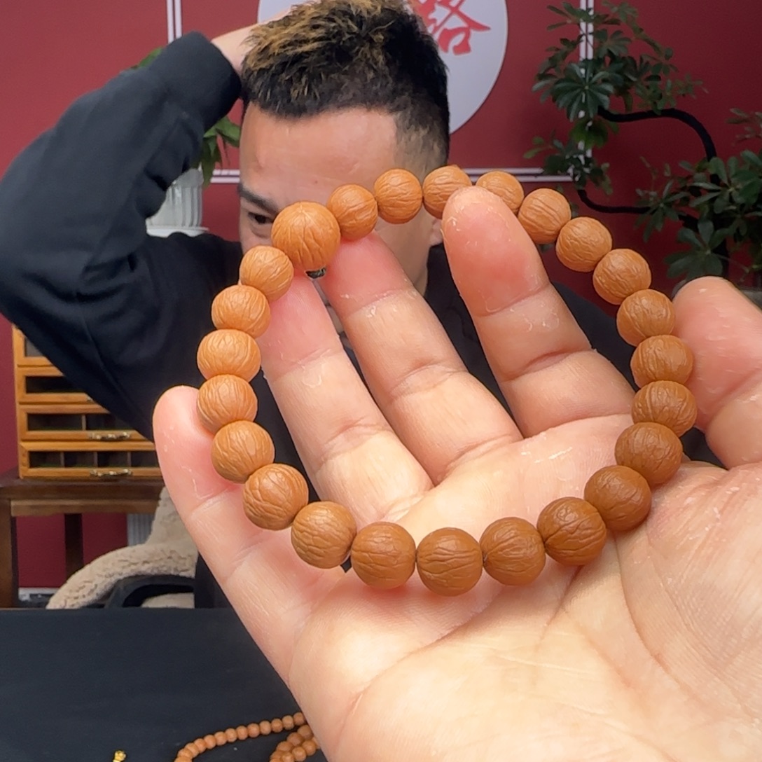 轩***话猴头核桃手串12小聚宝盆