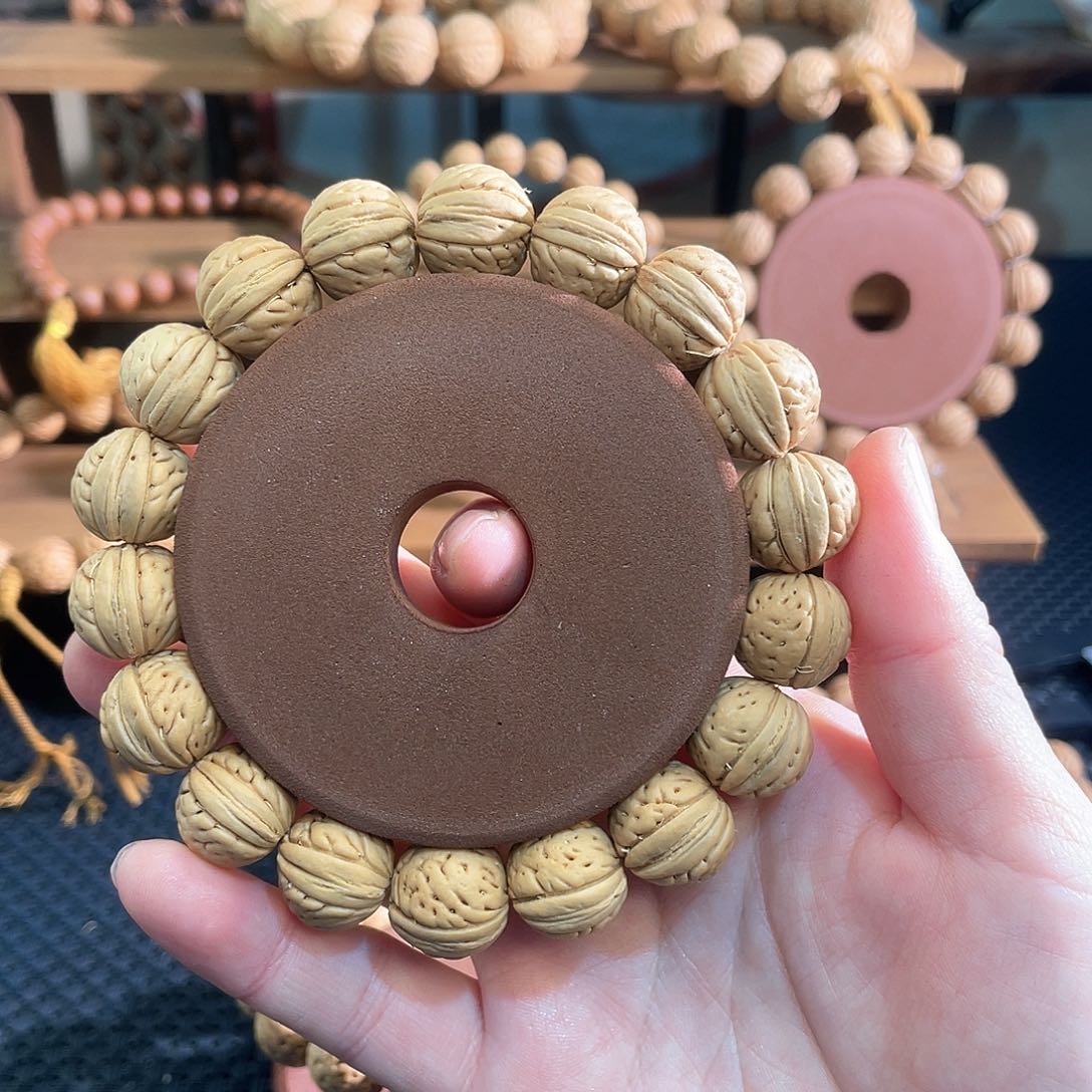 山****风15加野生桃核单圈手串