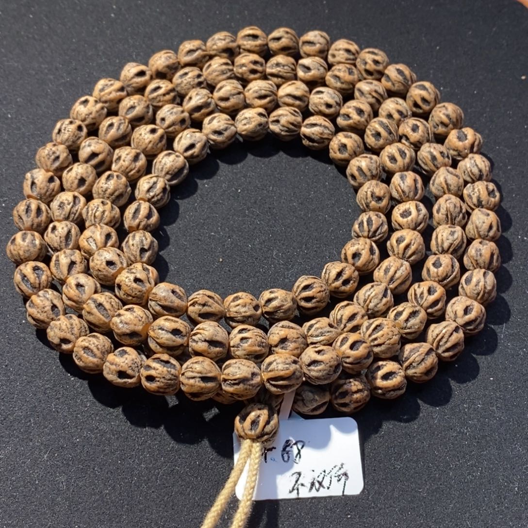 孤***狼柏香籽/百香籽吊坠