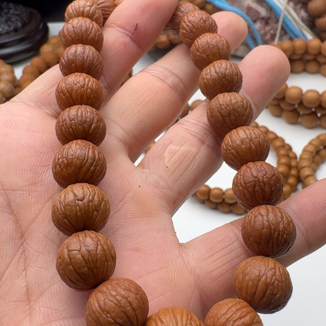 淮***哥猴头核桃手串原皮原色凤羽手持特价