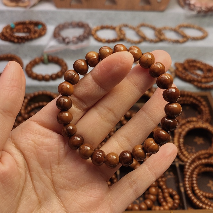 果皮天然库克精挑屁桃8*9单圈手串