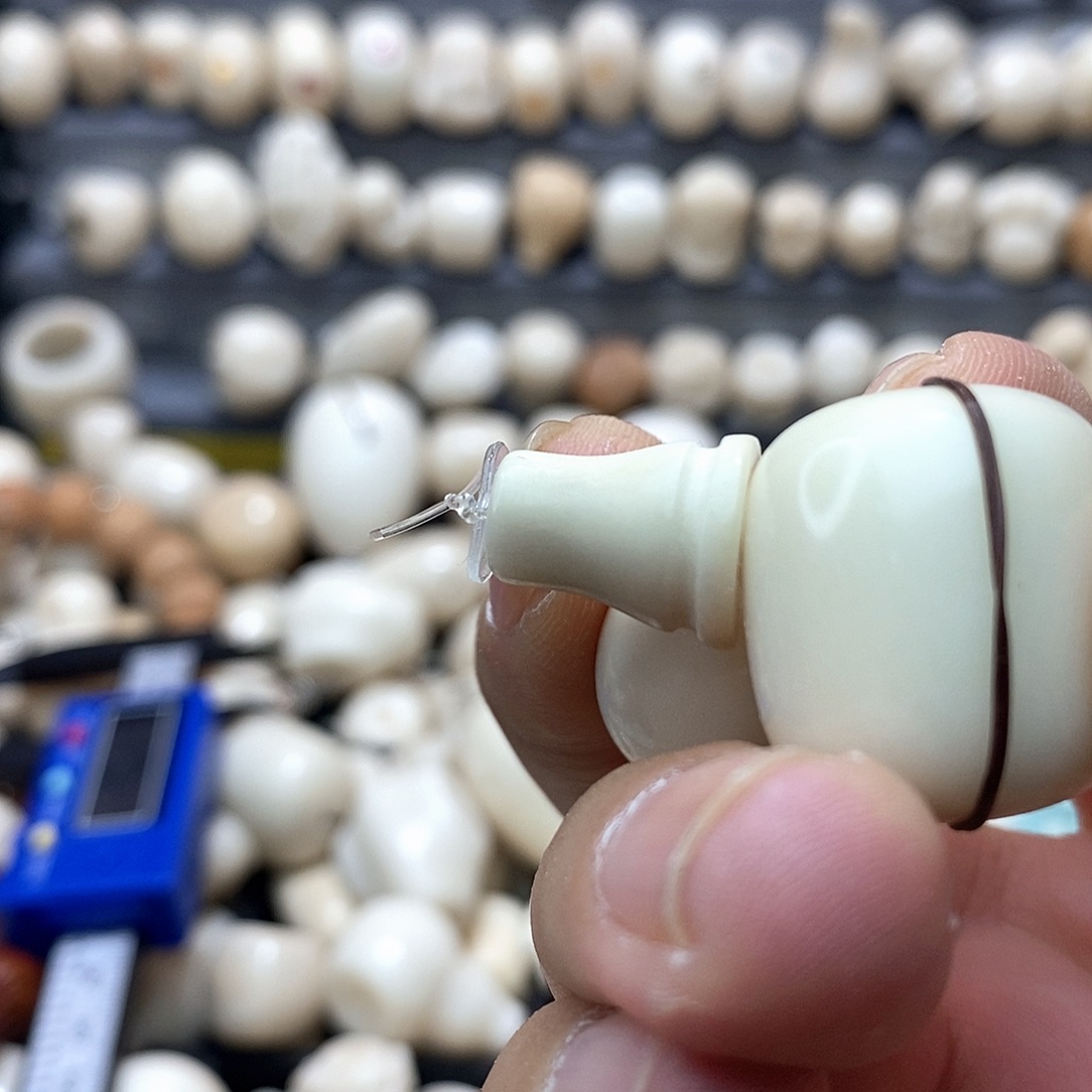 潇***）吊坠菩提根/象牙果