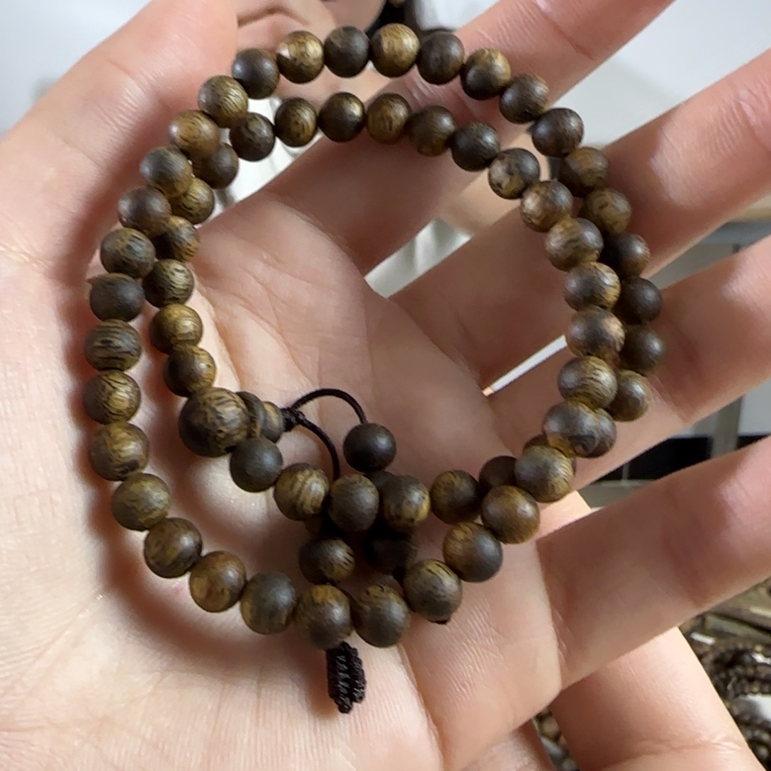 梦***人奇楠沉香手串 双圈0.6 6.6g+发一