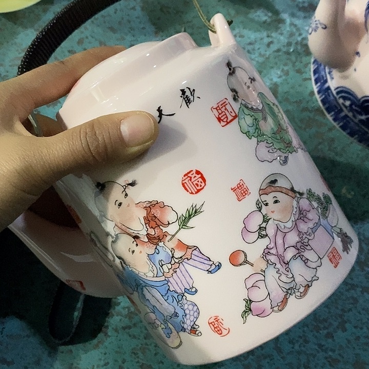 摆件陶红稀土童子提梁壶