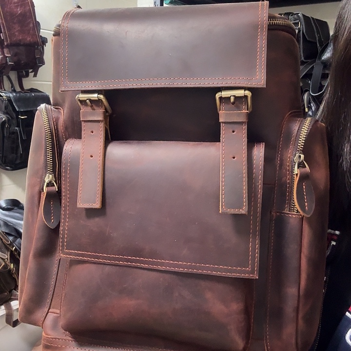 回***意头层牛皮疯马皮2.2背包