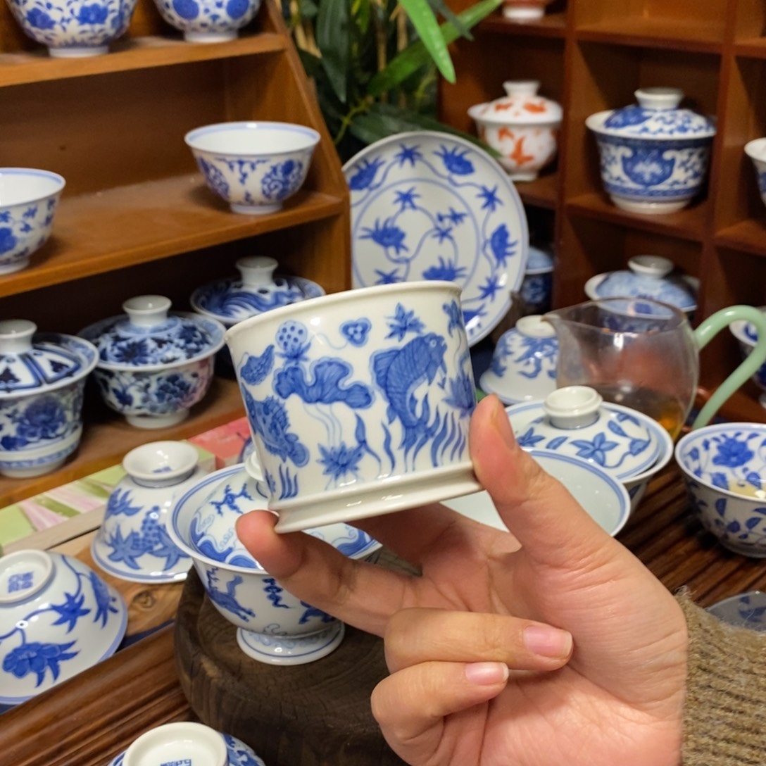 青炎亚飞鱼藻纹容天杯