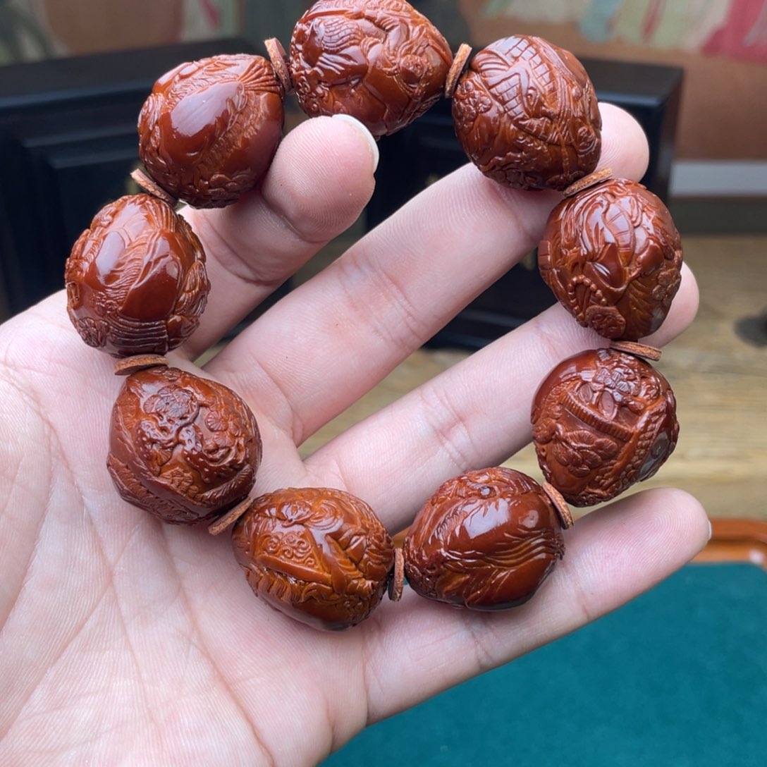 橄榄核吊坠W****༽西游表弟回血2.4