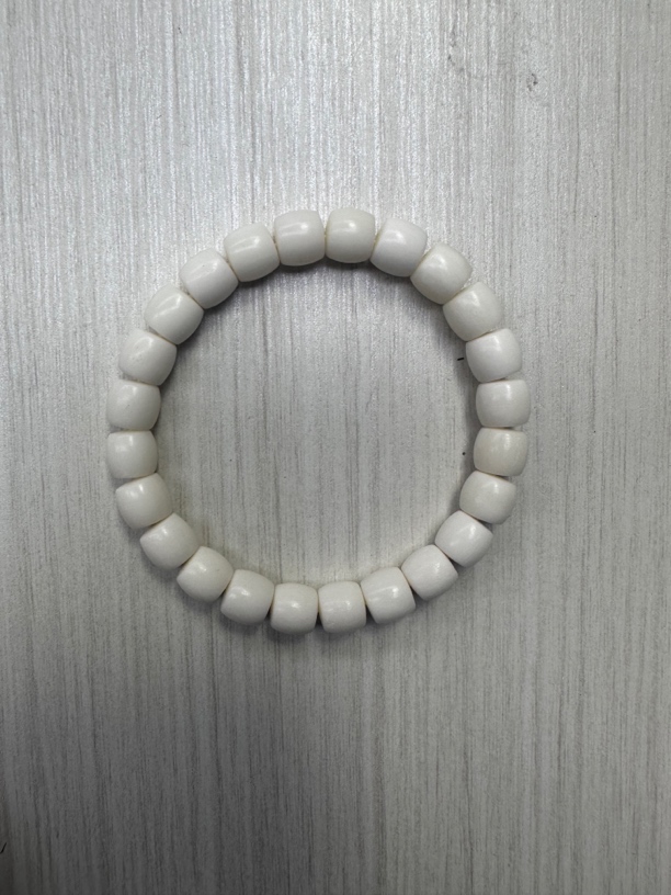 125号骆驼牙0.9桶珠手串