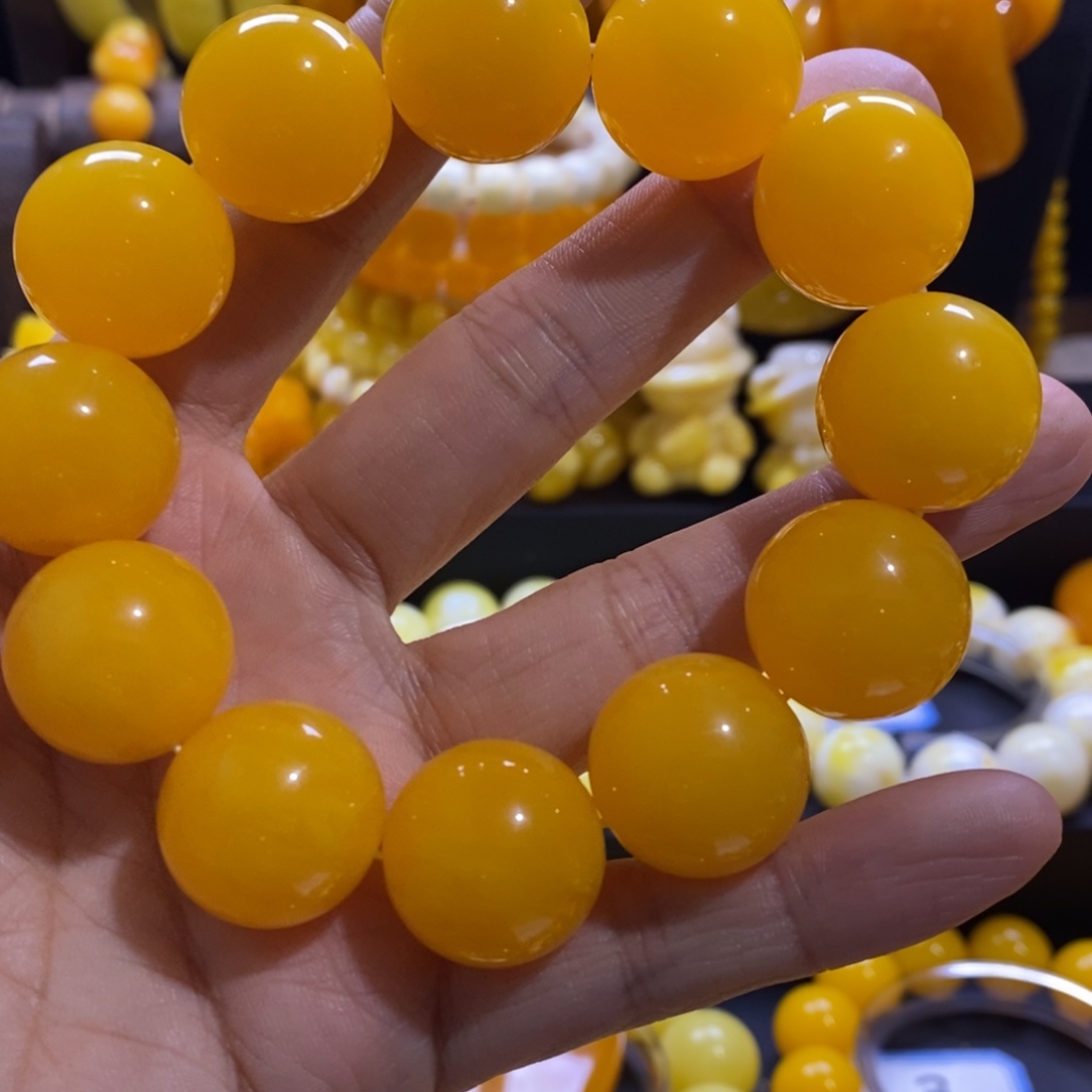 t***r非金属全品无暇20鸡油黄精品手串