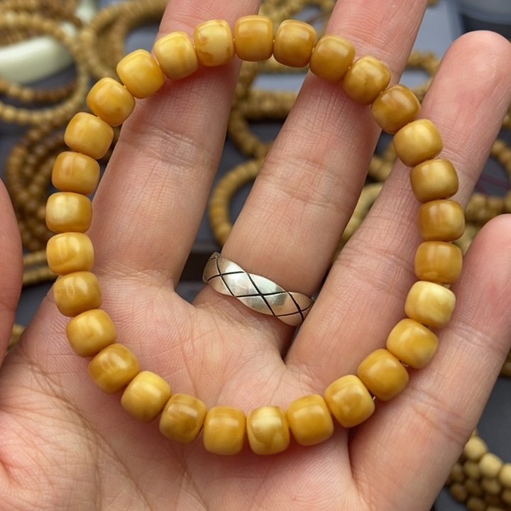 龙眼菩提手串小**?8*7全品玉化黄手串