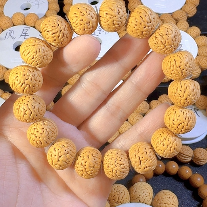 刘***祥桃核吊坠南瓜玻璃球