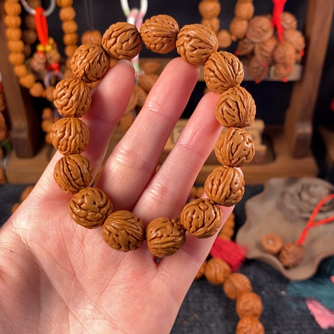 吊坠桃核桃枭手串