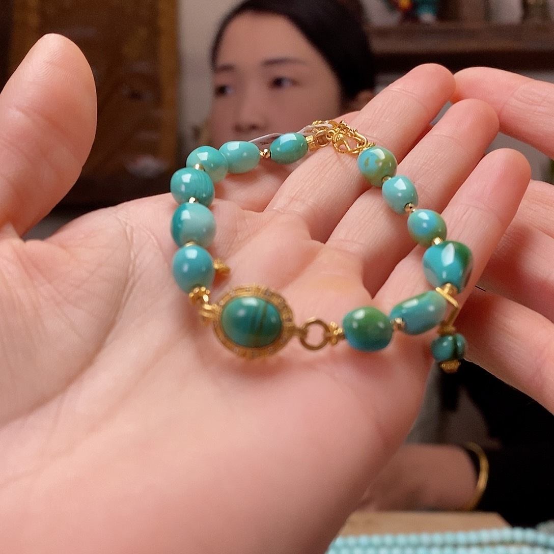 绿松石珠宝奇石18K金镶嵌杨****子