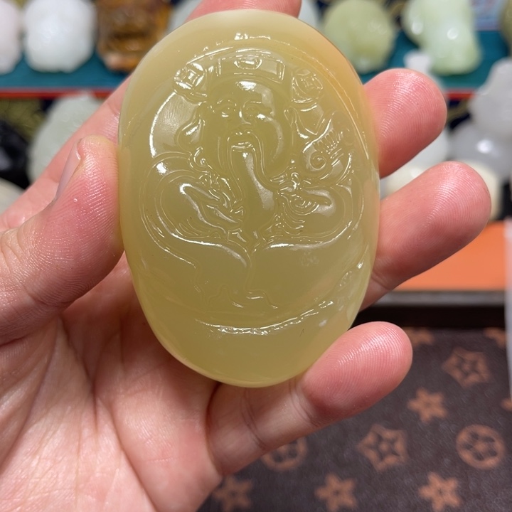 英***姐石材方解石手把件不退换